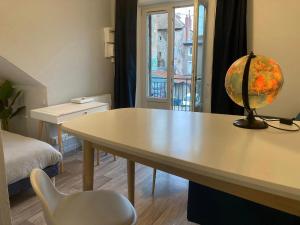 Appartements Le Voyageur : photos des chambres