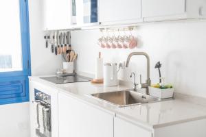 Sandy Bay Home with roof terrace and sea views