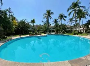 Hermoso apartamento en Manzanillo con alberca y cancha de tenis, Ideal para relajarse y disfrutar de una escapada tranquila en el paraíso tropical - Miramar