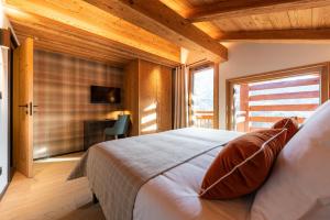 Chalets Chalet La Manigodine Contact O6 6I 4O 9I I9 Piscine Sauna Billard 18 a 24 pers : photos des chambres