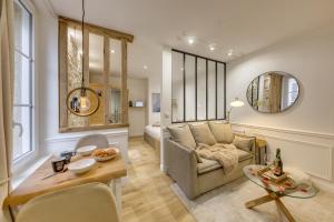 Appartements Le Petit Paris - Cocon & Spa & Sauna : photos des chambres