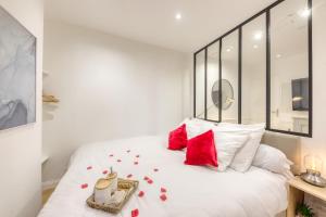 Appartements Le Petit Paris - Cocon & Spa & Sauna : photos des chambres