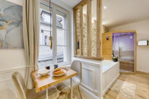 Appartements Le Petit Paris - Cocon & Spa & Sauna : photos des chambres