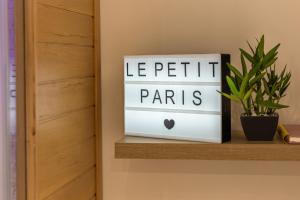 Appartements Le Petit Paris - Cocon & Spa & Sauna : photos des chambres