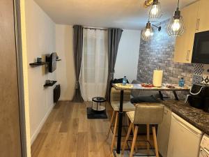 Appartements Studio moderne proche Disney Land : photos des chambres