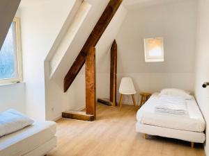 Appartements Gite Le Velo Rouge - Airco & Parking : photos des chambres