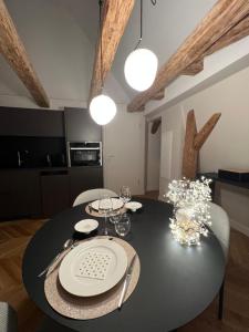 Appartements O verso du Chateau - STUDIO 22 : photos des chambres