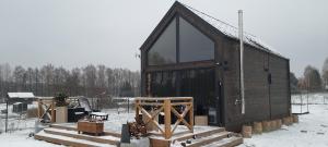 Domek Mazurski całoroczny nad jeziorem z Jacuzzi SPA