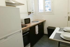 Appartements Grand Studio, Parking gratuit : photos des chambres