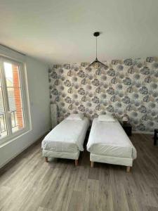 Appartements Grain de cafe Barneville Plage : photos des chambres