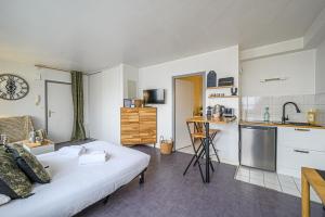 Appartements Le Kokoon - Studio proche gare avec parking prive : photos des chambres