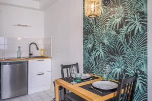 Appartements Le Kokoon - Studio proche gare avec parking prive : photos des chambres