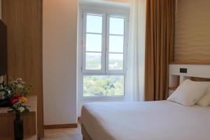 Hotels Le Royal Hotel Restaurant : photos des chambres