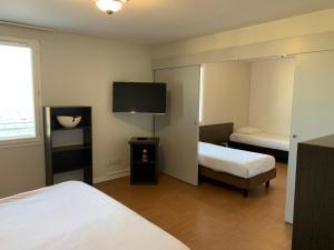 Appart'hotels ApartHotel Sainte-Marthe : photos des chambres