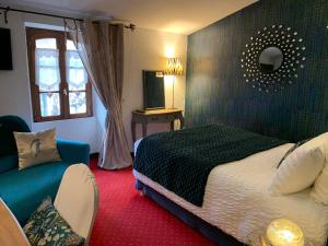 Hotels Le Chapeau Rouge : photos des chambres