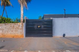 Casa com 2 suítes, cozinha completa , área de lazer, piscina infantil, 10 min do parque aquático