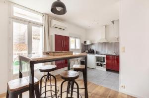 Appartements Le 7 : photos des chambres