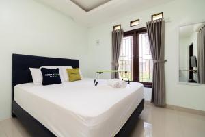 Urbanview Hotel Kampung Istal Megamendung Puncak by RedDoorz