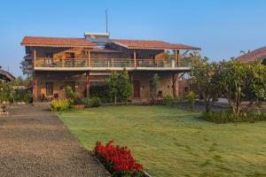 SaffronStays Lake House Bouganvillea, Nashik - rustic pool villa with great lake views and patio dining