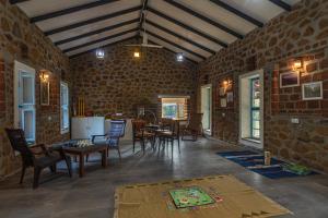 SaffronStays Lake House Bouganvillea, Nashik - rustic pool villa with great lake views and patio dining