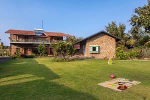 SaffronStays Lake House Bouganvillea, Nashik - rustic pool villa with great lake views and patio dining