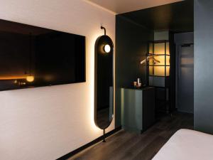 Hotels Novotel Paris Suresnes Longchamp : photos des chambres