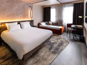 Hotels Novotel Paris Suresnes Longchamp : photos des chambres