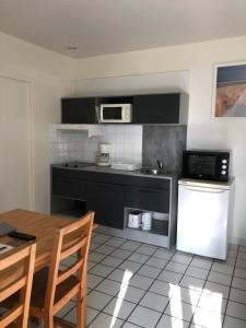 Appartements Les Pastourelles : photos des chambres