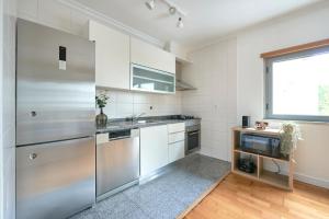 Apartment with Private Terrace & Car Garage