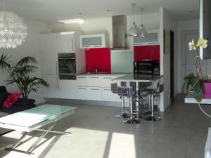 Appartements Apartment L'Aquarius : photos des chambres