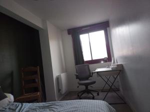 Appartements -- Le Refuge, a 50 metres de la Gare -- : photos des chambres