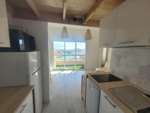 Appartements Berea - Les Cormorans - Vue port et mer : photos des chambres