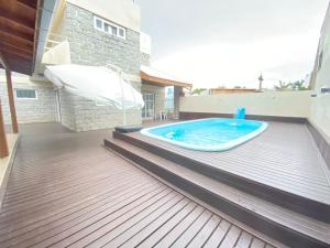 Casa Bombinhas com Piscina