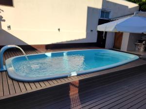 Casa Bombinhas com Piscina