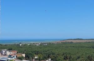 Apartamento aconchegante, linda vista e com garagem