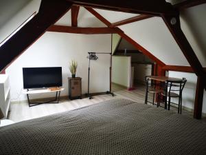 Appartements Le Moment Normand : photos des chambres