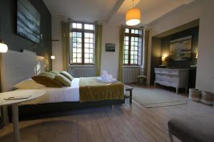 B&B / Chambres d'hotes La Haute Flourie - bed and breakfast : photos des chambres