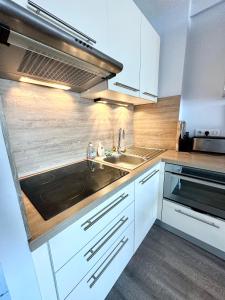 Appartements EXCEPTIONNEL ! T3 Duplex – Vue mer 180° sur le port de Lomener : photos des chambres