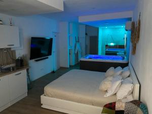 Superbe suite avec jacuzzi patio et sauna