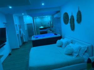 Superbe suite avec jacuzzi patio et sauna