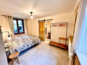 Appartements La jolie maison bleue, au coeur de l'Alsace : photos des chambres
