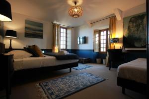 B&B / Chambres d'hotes La Haute Flourie - bed and breakfast : photos des chambres