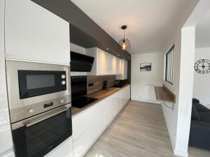 Appartements Magnifique appartement a deux pas du centre ville! : photos des chambres