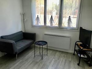 Appartements Maisonnette de charme au calme pres des bords de Marnes : photos des chambres