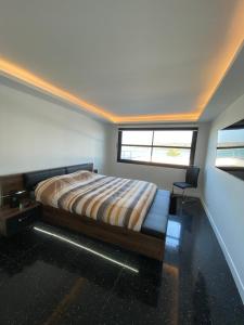 Villas MAISON VILLA montmarin VUE MER BRETAGNE NORD VERS ROSCOFF CARANTEC MORLAIX PLOUESCAT LOCQUENOLE AVEC SON SPA ET SA VUE MER : photos des chambres