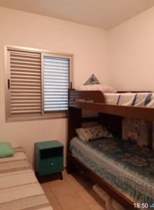 Apto pé na areia com vista para o mar no Litoral Sul