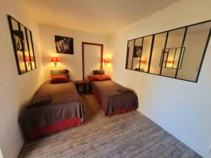 Maisons de vacances Gite de la Mignonerie du Chateau de Jallanges pour 19 personnes avec 4 ou 7 chambres : photos des chambres
