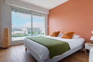 Maisons de vacances Magnifique maison coloree avec jacuzzi - La Rose des Vents : photos des chambres