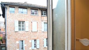 Appartements Un jour d'ete a Albi : photos des chambres