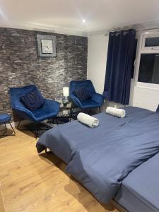 Spacious loft converted bedroom with toilet only, Separate guest shower on ground floor plus free parking